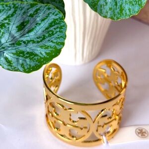 TORI BURCH•Gold Reva Wide Logo Cuff Bracelet.